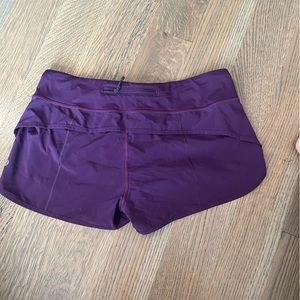 Purple Lululemon running shorts